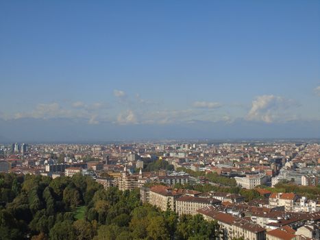 Turin, Italy - 06/06/2020: Beautiful panoramic view from Mole Antoneliana to the city of Turin in summer days with clear blue sky and the alps in the background.