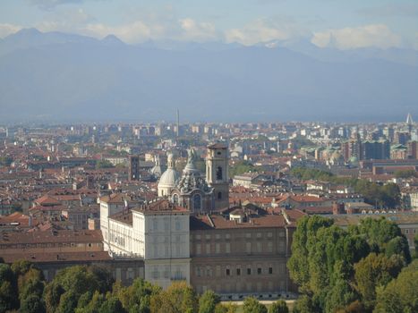 Turin, Italy - 06/06/2020: Beautiful panoramic view from Mole Antoneliana to the city of Turin in summer days with clear blue sky and the alps in the background.