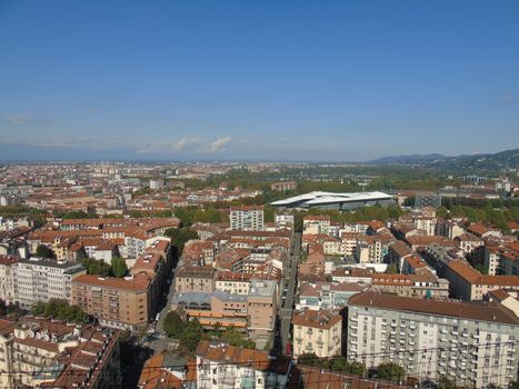 Turin, Italy - 06/06/2020: Beautiful panoramic view from Mole Antoneliana to the city of Turin in summer days with clear blue sky and the alps in the background.