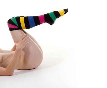 Nude Woman in Stripy Socks Lying on the Floor