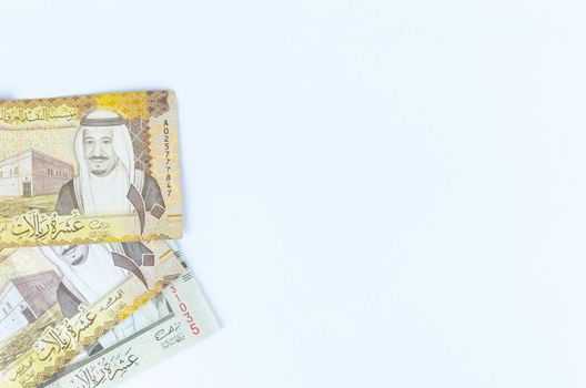 Saudi Arabia money on white background.