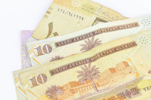 Saudi Arabia money on white background.