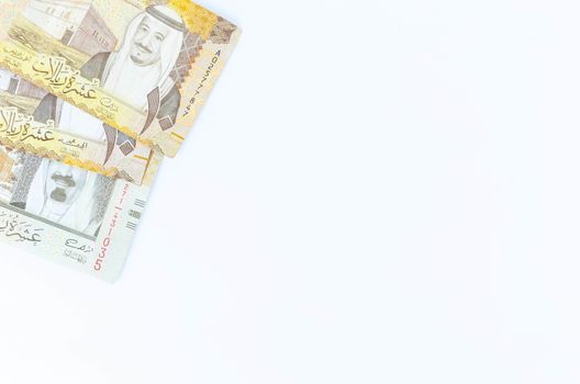 Saudi Arabia money on white background.