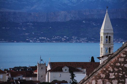 Supetar city in Brac island, Croatia, view from the mountain in the evening