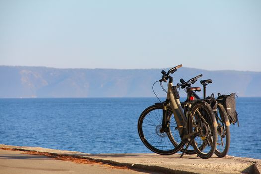 Two bicycles near the sea summer travel vacation concept