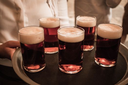beer serving waiter bar germany dark dusseldorf. High quality photo