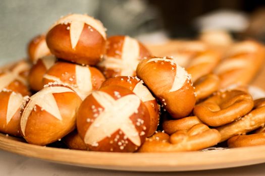 bun roll pretzel salty food bakery basket german breakfast . High quality photo