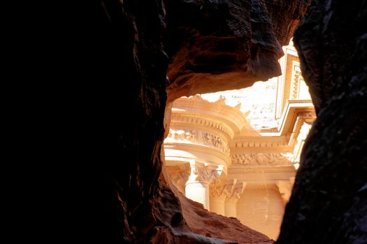 The treasure house of Petra from a perspective between the rocks in Wadi Musa, Petra, Jordan , middle east