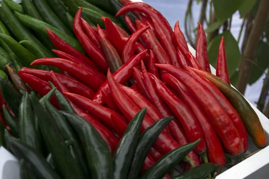 Colorful chili is a spicy condiment are several to see in Thai food market.