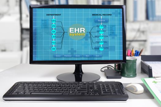 EHR or electronic health record system for hospital management show on computer monitor in office.
