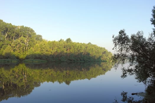 Beautiful summer landscape with river and forest