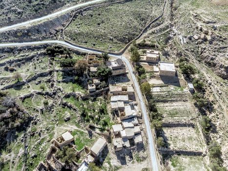 Aerial view of the village Dana and its surroundings at the edge of the Biosphere Reserve of Dana in Jordan, made with drone