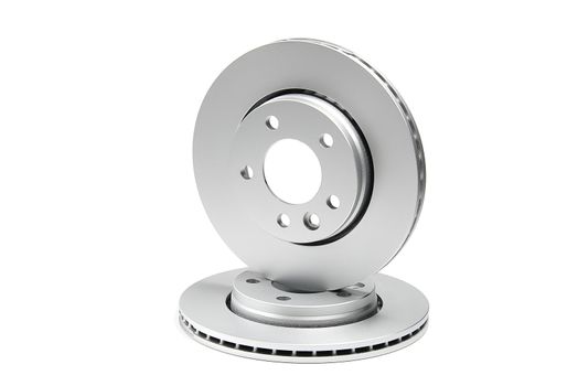Brand new brake discs for the minivan or transporter car. Isolated on white