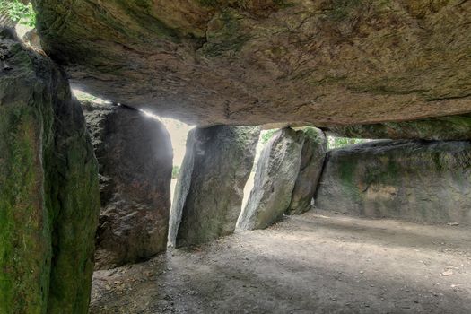 Inside a prehistoric burial chamber or Dolmen La Roche aux Fees - most important megalithic monument of Brittany