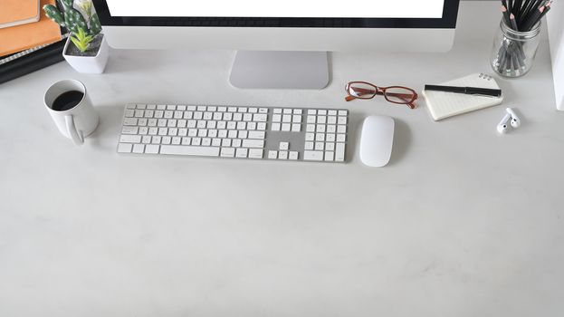 Top view shot of office desk with marble table. Office equipment on working desk. Modern office concept.