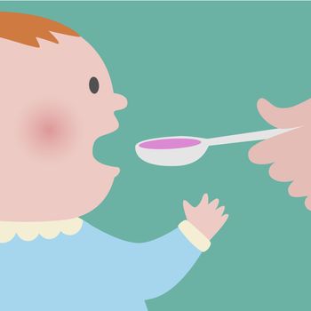 Close up of baby taking spoon of pink syrup medicine