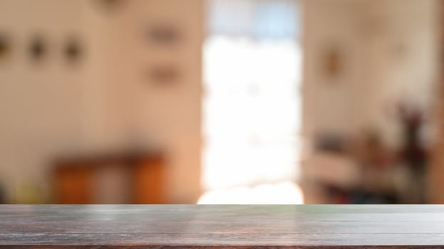 Montage wooden table in living room background with empty wood desk for present product.