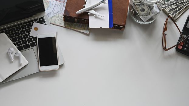 Travel stuff on the white table. Vacation travelling concept.