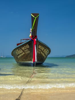 Ao Nang, Thailand - FEBRUARY 11, 2019: Traditional long tail boat on Ao Nang beach in Krabi Thailand
