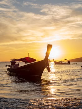 Traditional long-tail boat on the beach in Thailand