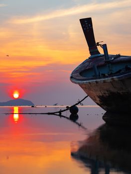 Traditional long-tail boat on the beach in Thailand