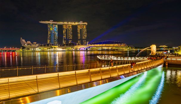 SINGAPORE CITY, SINGAPORE - FEBRUARY 5, 2019: Marina Bay Sands at night the largest hotel in Asia. It opened on 27 April 2010. View from the Esplanade bridge