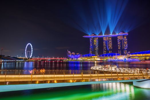SINGAPORE CITY, SINGAPORE - MARCH 3, 2019: Spectra Light and Water Show Marina Bay Sand Casino Hotel Downtown Singapore 