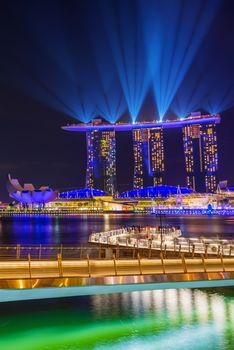 SINGAPORE CITY, SINGAPORE - MARCH 3, 2019: Spectra Light and Water Show Marina Bay Sand Casino Hotel Downtown Singapore 