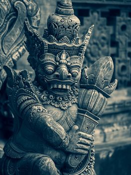 Traditional stone statues depicting demons, gods and Balinese mythological deities in Bali,Indonesia
