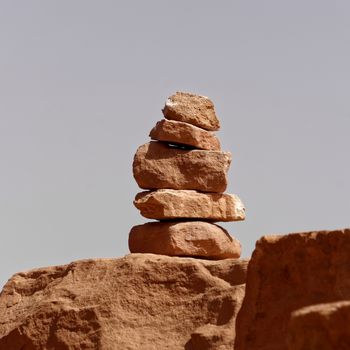 Signpost built by Bedouins and guides from stacked stones in the desert of the Wadi Rum Nature Reserve, Jordan, middle east
