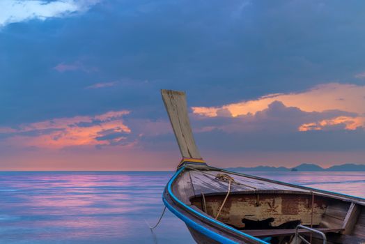 Traditional long-tail boat on the beach in Thailand