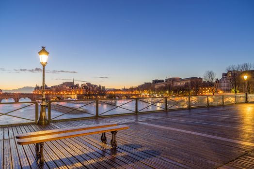 River Seine with Pont des Arts at sunrise in Paris, France