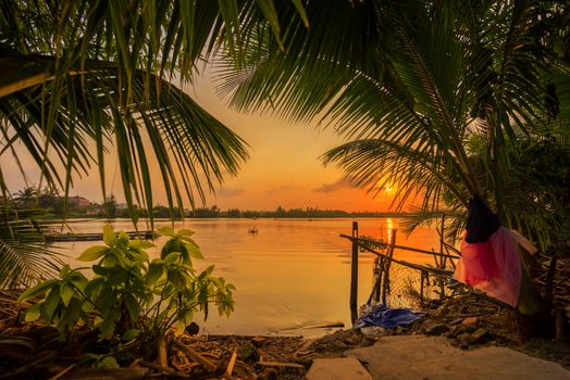Vinh Cura Dai river in Hoi An Vietnam at sunset
