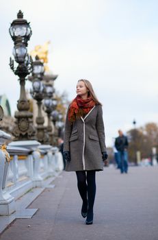 Beautiful girl walking in Paris