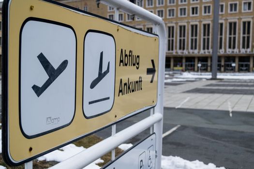 Berlin, Germany, February 2013: abflug ankunft, arrival departure directional sign outside of an airport