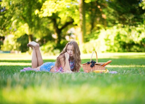 Beautiful girl having a picnic