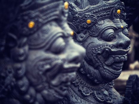 Stone sculpture on entrance door of the Temple in Bali Indonesia