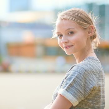 Girl walking at La Defense, business district of Paris