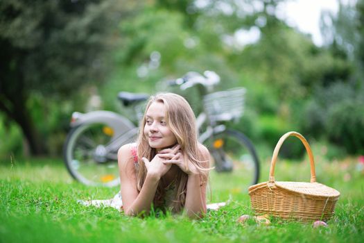 Beautiful young girl spending her time in the countryside