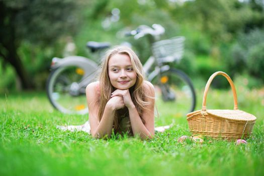 Beautiful young girl spending her time in the countryside 