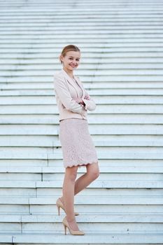Beautiful young self confident woman in business suit