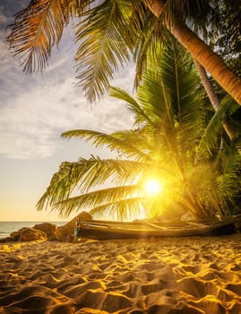 Surin beach at sunset in Phuket island Thailand