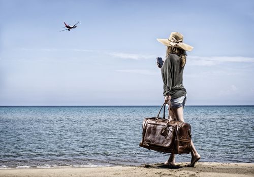 Woman on the beach - Travel concept