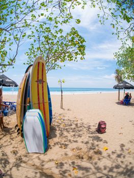 KUTA BALI - INDONESIA, JULY 20 : Surfboards on the famous beach on Kuta in Bali Indonesia July 20th, 2015