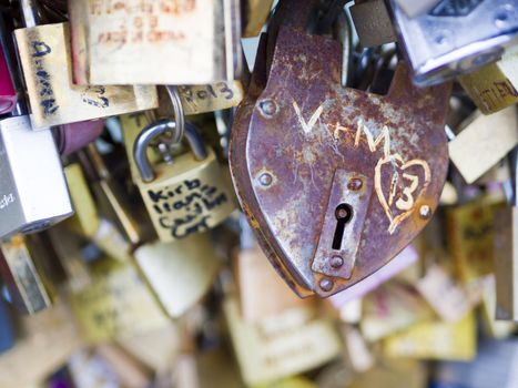PARIS - DEC 6: Love Padlocks at Pont de l'Archevche on December 6, 2013, in Paris. The thousands of locks of loving couples symbolize love forever.
