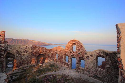 Oia castle at sunrise - Santorini island Greece