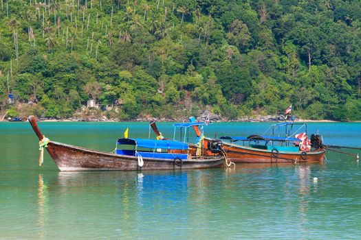 Long tailed boat at beautiful bay of Koh Phi Phi island at day time, Thailand