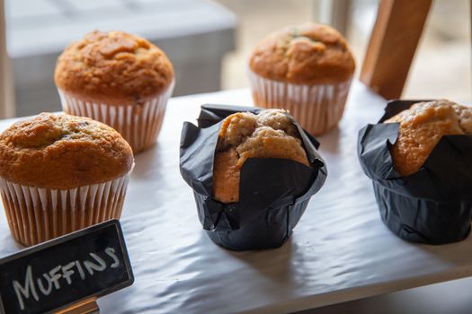 Warm breakfast muffins on display