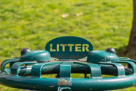 A public litter bin in  a London park