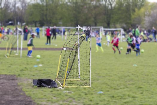 Children playing football in the park